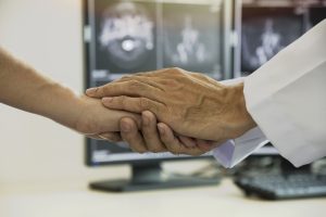 Doctor giving sympathy to the patient